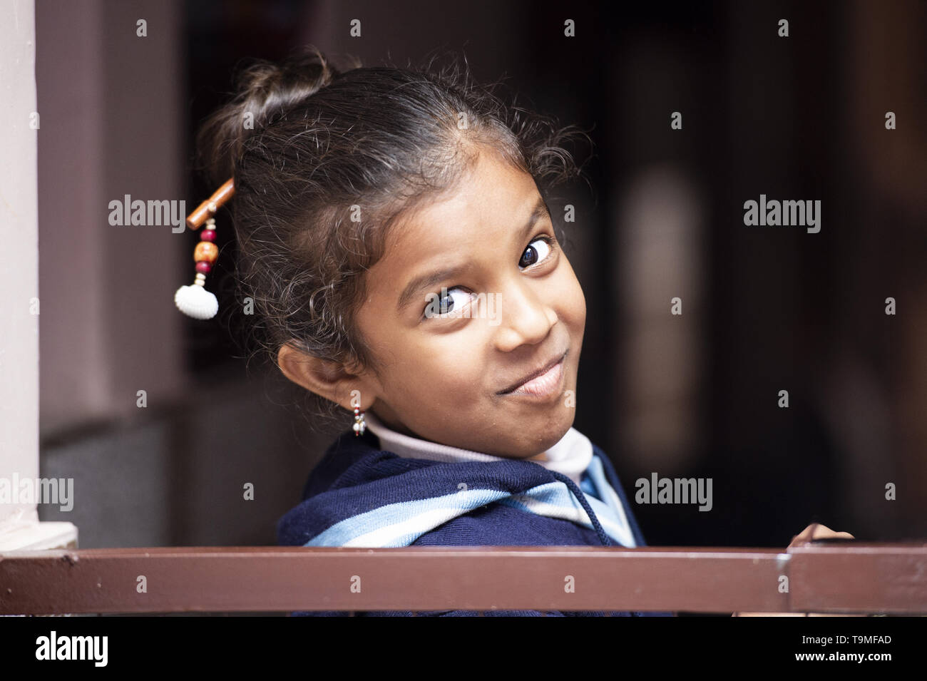 Portrait of a smiling little beautiful child in Varanasi. Varanasi is also known as Benares. Stock Photo
