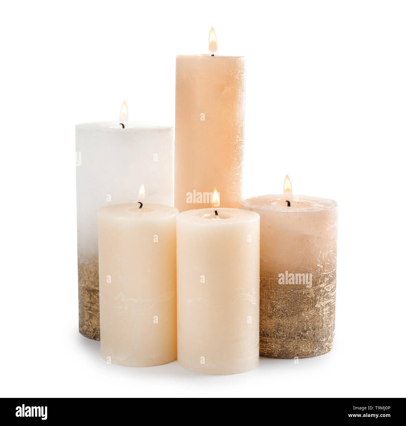 Burning candles on white background Stock Photo - Alamy