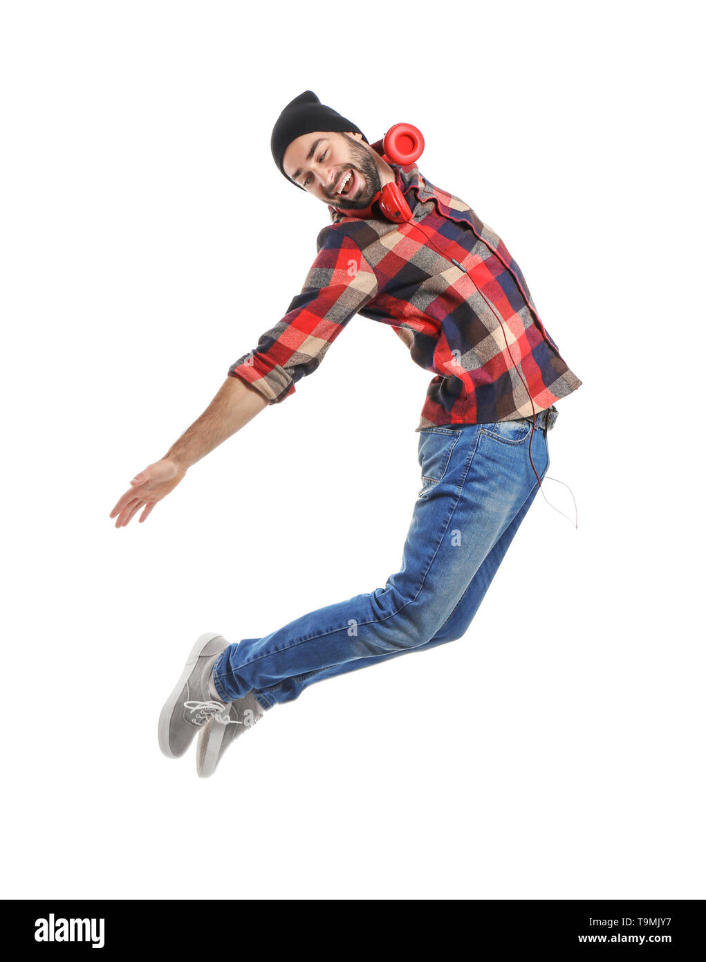 Jumping male dancer on white background Stock Photo
