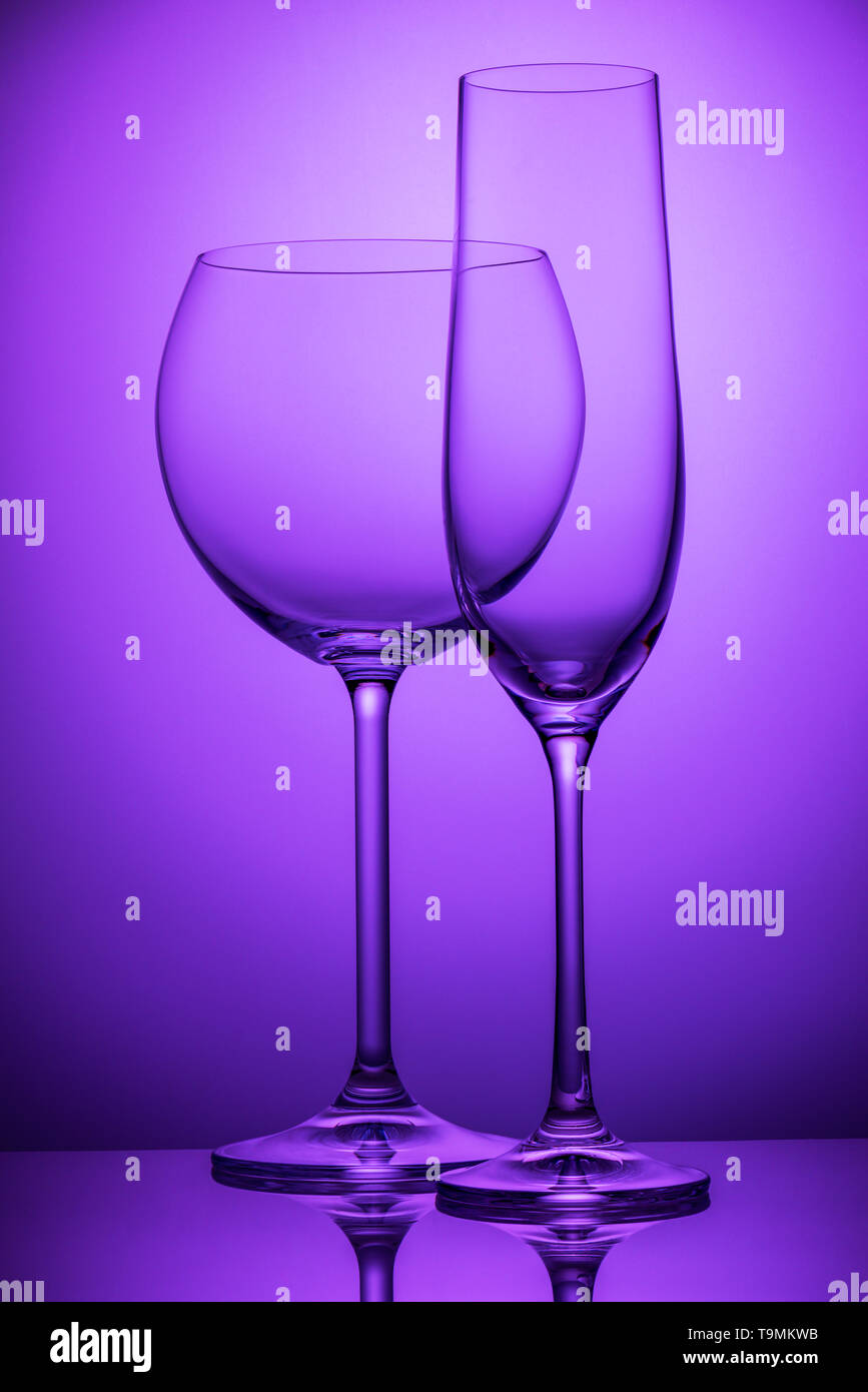 Two wineglasses on purple Stock Photo