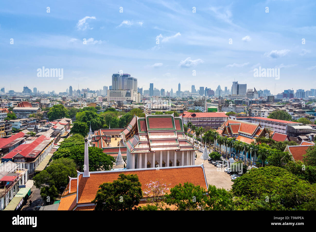 Aerial view on Bangkok downtown skyline with old traditional buildings in front, capital of Thailand Stock Photo