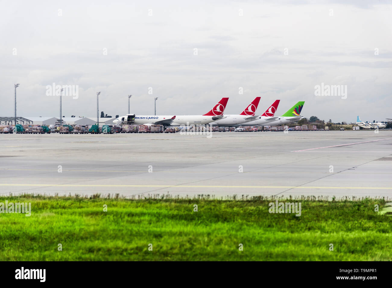 Izmir, Turkey - November 17, 2018. Istanbul airport which is out of service now. With three Turkish airlines cargo planes parked. Stock Photo