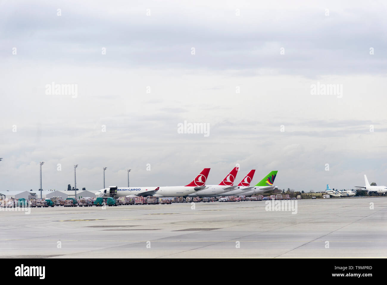 Izmir, Turkey - November 17, 2018. Istanbul airport which is out of service now. With three Turkish airlines cargo planes parked. Stock Photo