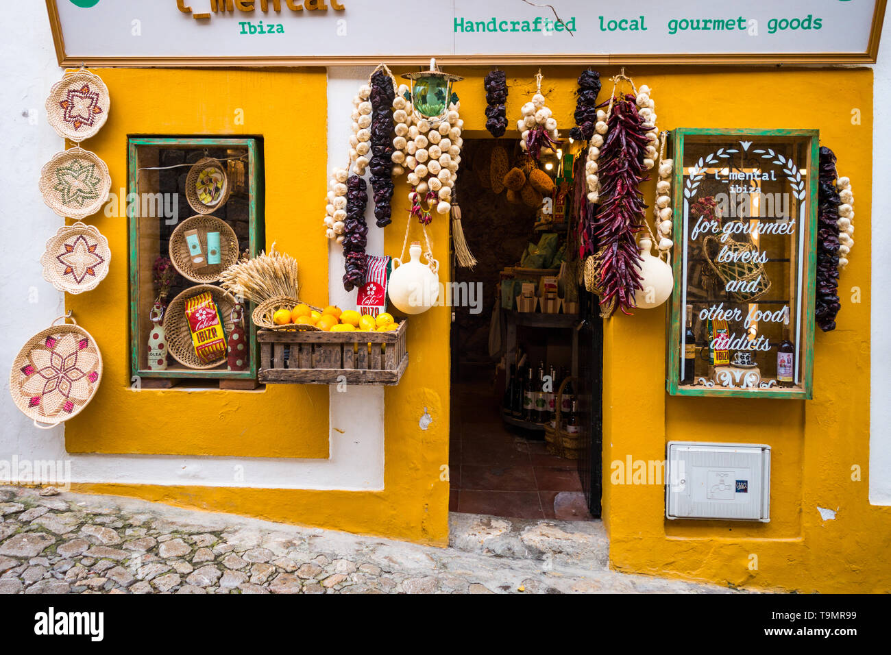 Brightly coloured shop selling traditional foods and handicrafts in Ibiza Town, Ibiza, Balearic Islands, Spain Stock Photo