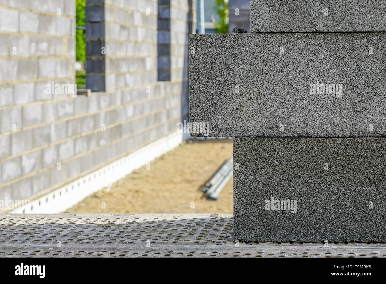 Concrete foundation and wall construction of a new house, view of