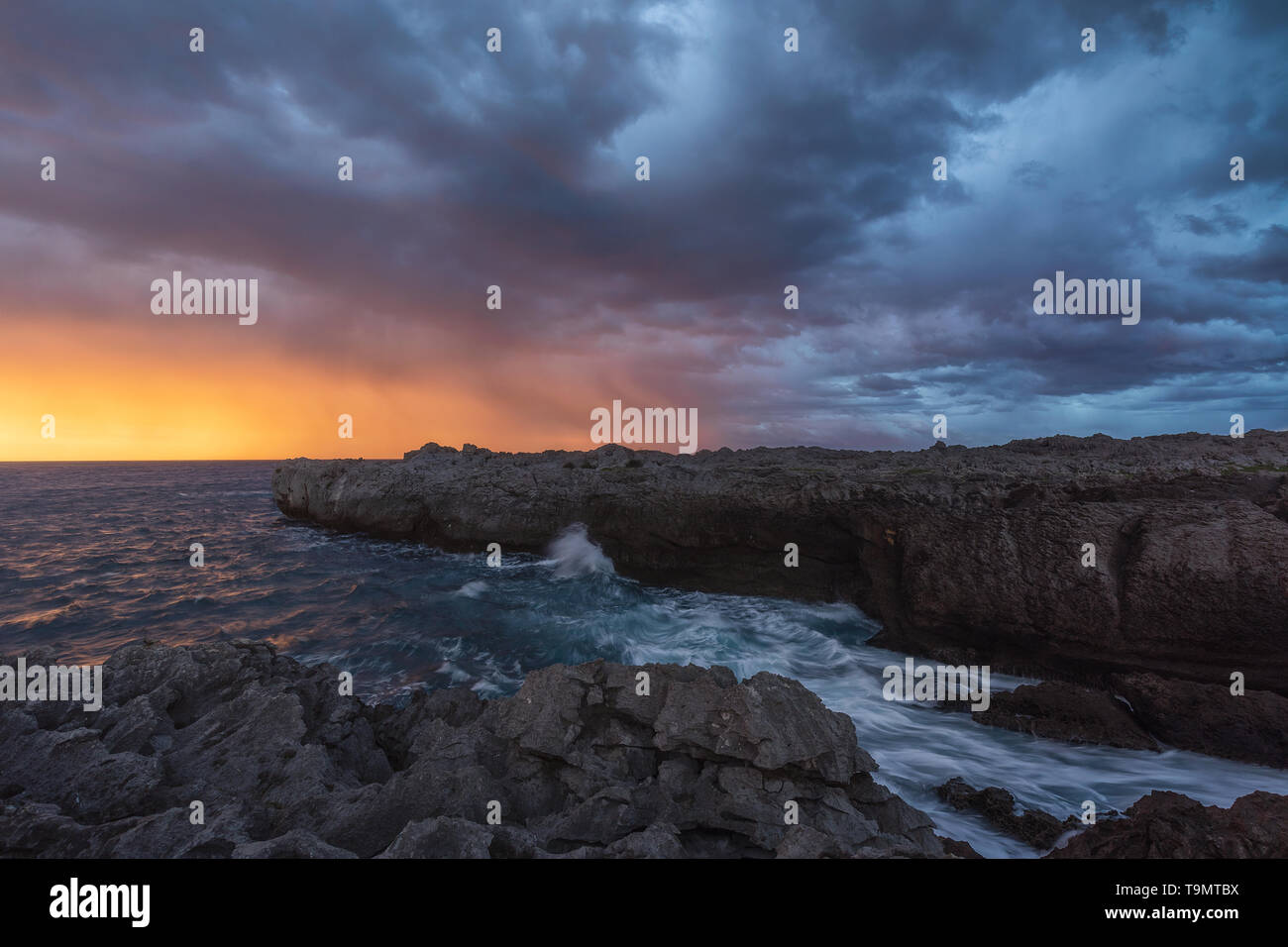 Storm over Islares cliffs in Cantabria, Spain Stock Photo