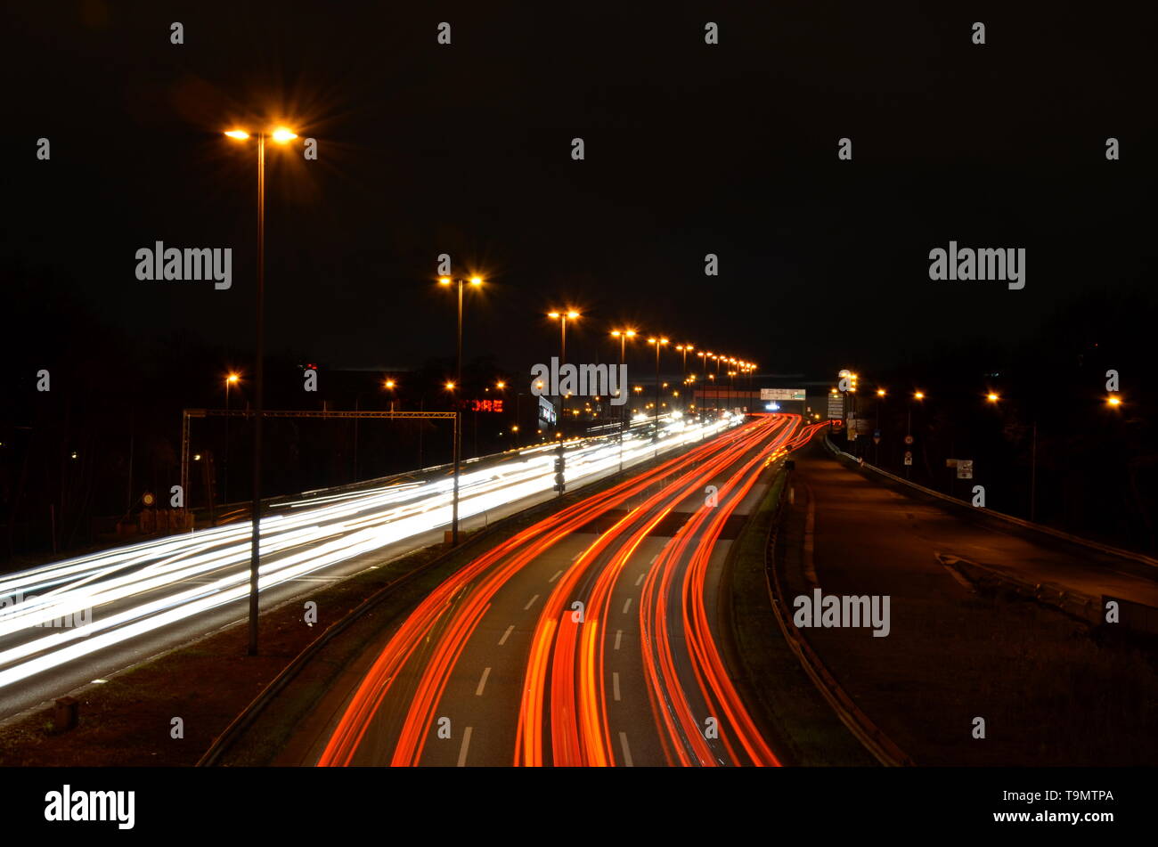 Cologne city highway at night, traffic light trails Stock Photo - Alamy