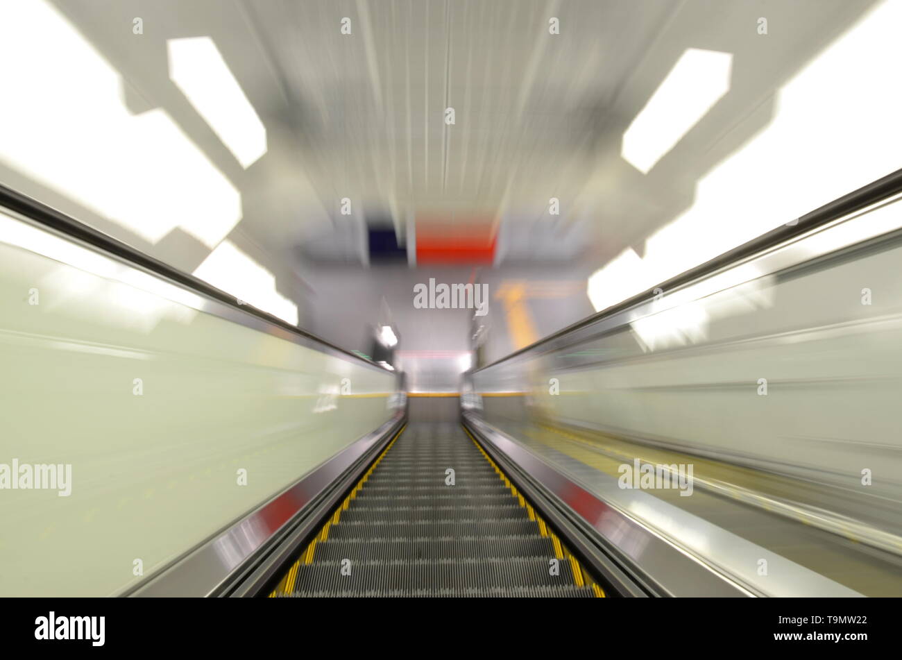 subway escalator motion speed, tunnel perspective Stock Photo