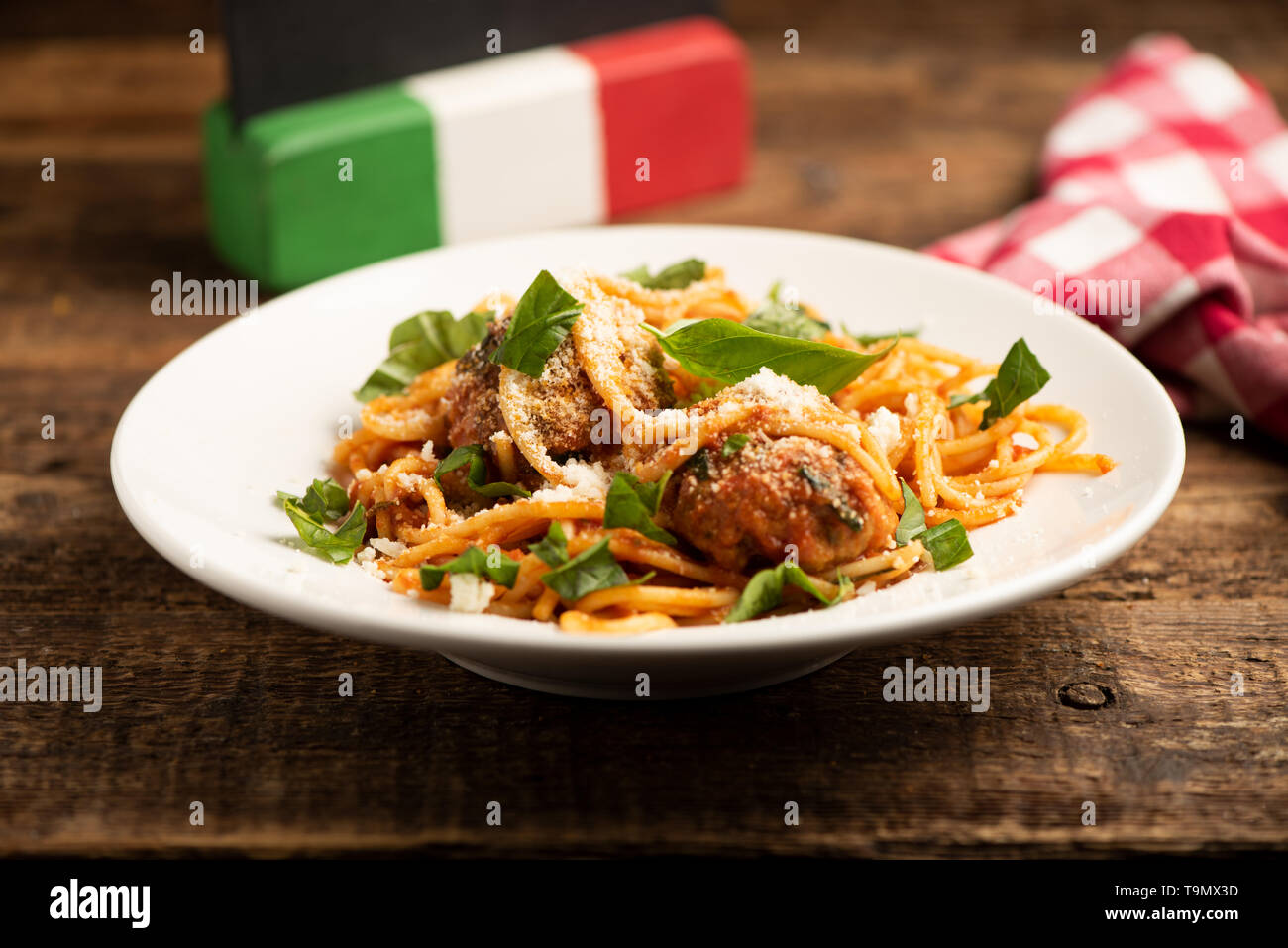 Beef meatballs with bolognese sauce and spaghetti. Close up Stock Photo