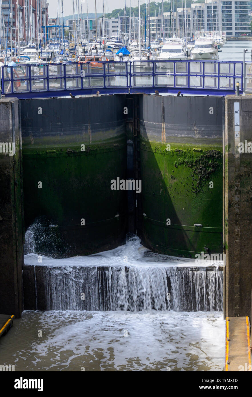 Massive hydraulic dock gates hold back millions of tons of water in a ...