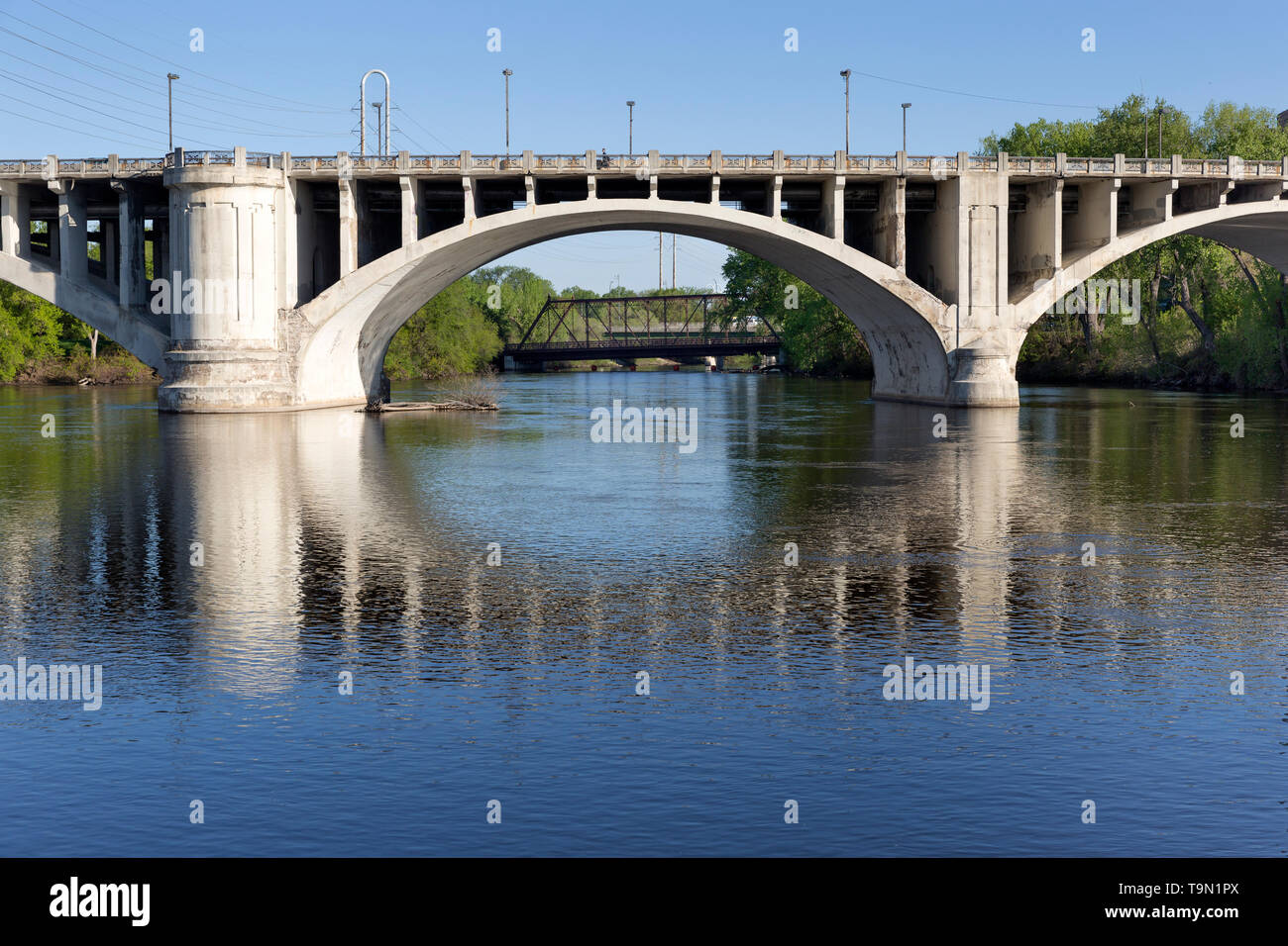 Detail of the Third Avenue Bridge spanning the Mississippi River in downtown Minneapolis, Minnesota.  The bridge was designed by Frederick W. Cappelen. Stock Photo