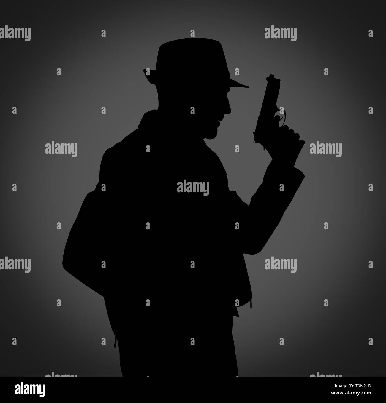 Silhouette of detective with gun on dark background Stock Photo