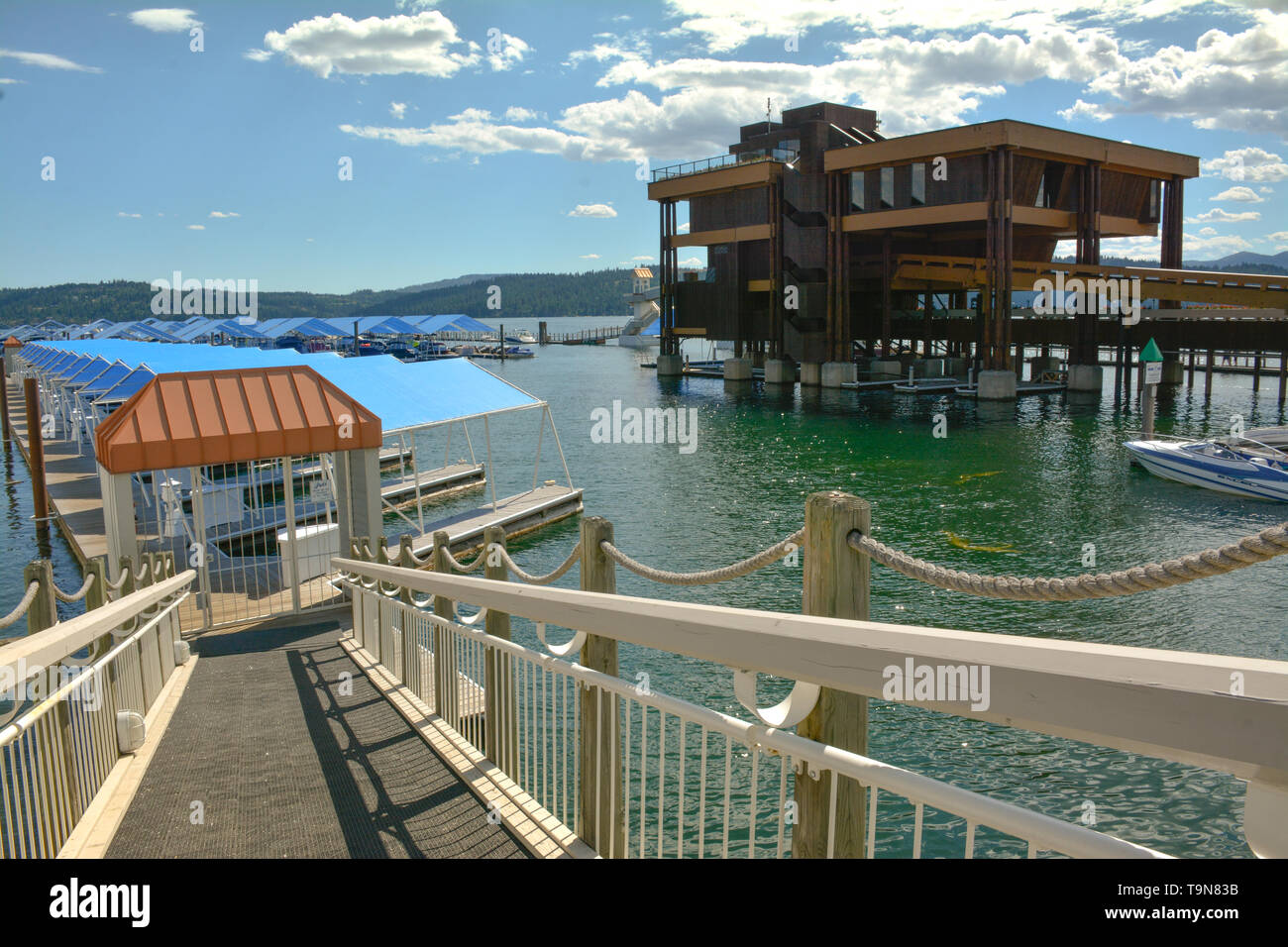 A modern gangway leads to the slips for boats along the Lake Coeur d