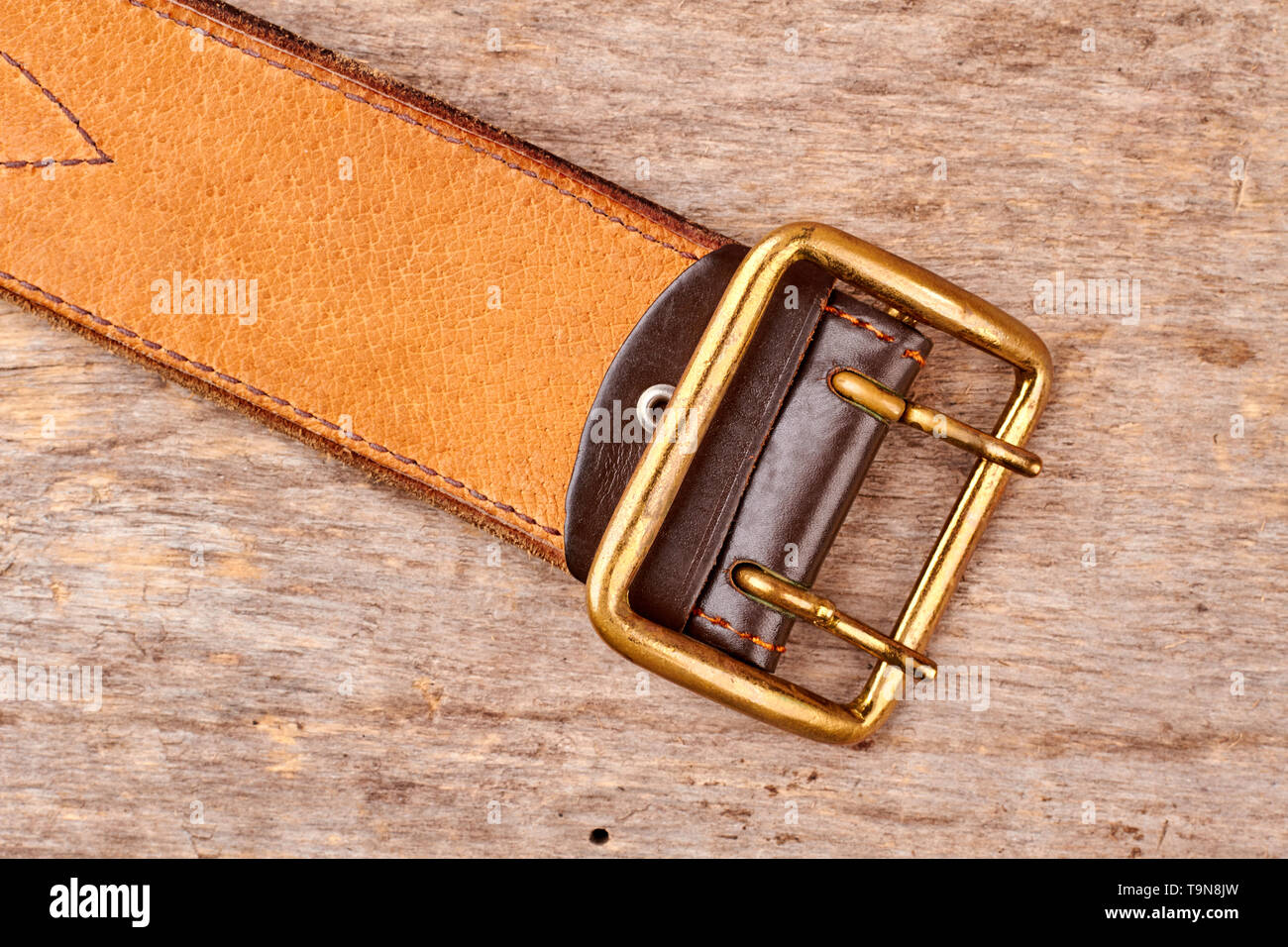 Golden leather belt. Stock Photo