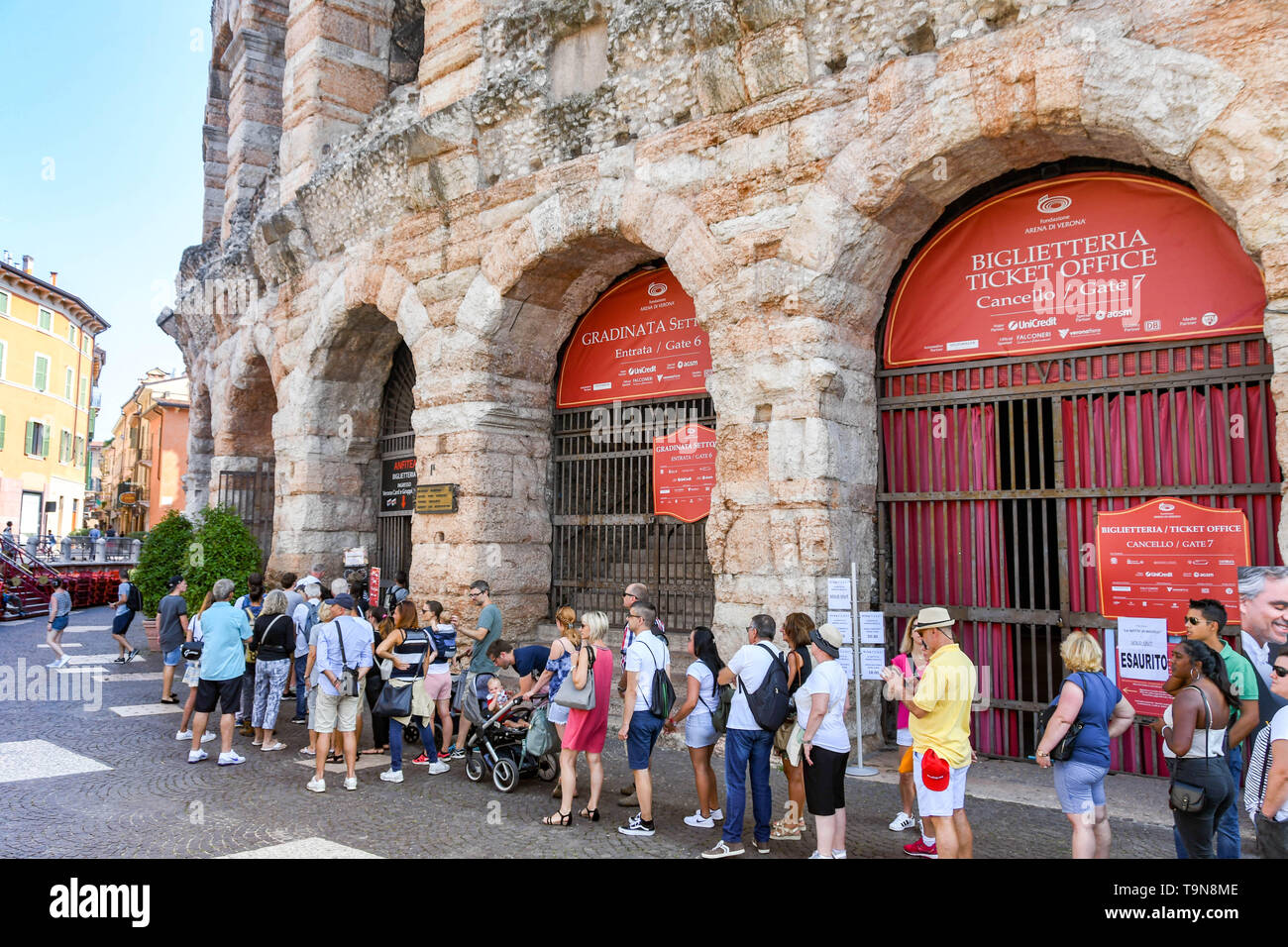 VERONA, ITALY - SEPTEMBER 2018: People queuing for tickets for the Verona Arena. It is a Roman amphitheatre in the city centre and is used for classic Stock Photo