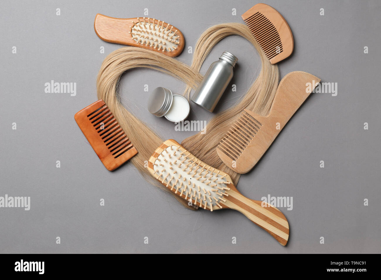 Flat lay composition with cosmetics for hair on grey background Stock ...