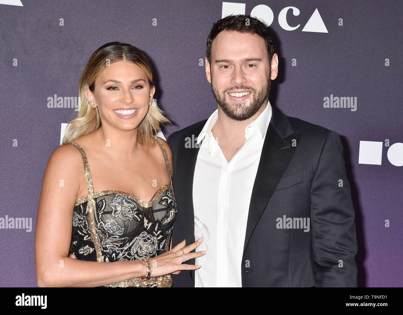 LOS ANGELES, CA - MAY 18: Scooter Braun (R) and Yael Cohen Braun attend