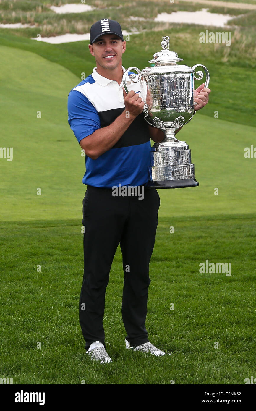 Bethpage, New York, USA. 19th May, 2019. Brooks Koepka holds the Wanamaker trophy after winning the 101st PGA Championship at Bethpage Black. Credit: Debby Wong/ZUMA Wire/Alamy Live News Stock Photo