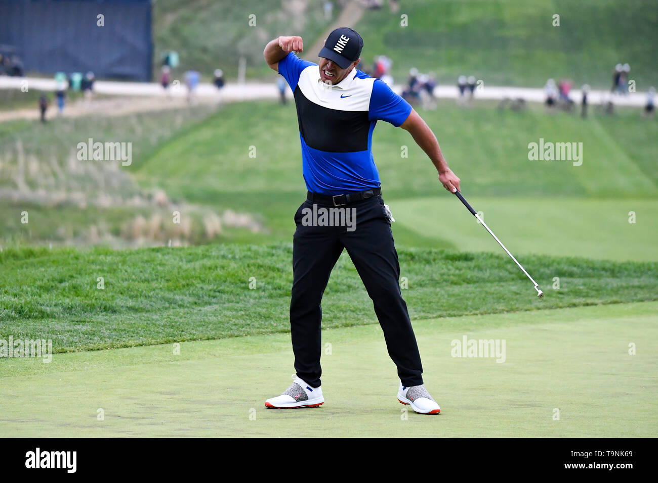 Bethpage, New York, USA. 19th May, 2019. Brooks Koepka reacts on the 18th green after winning