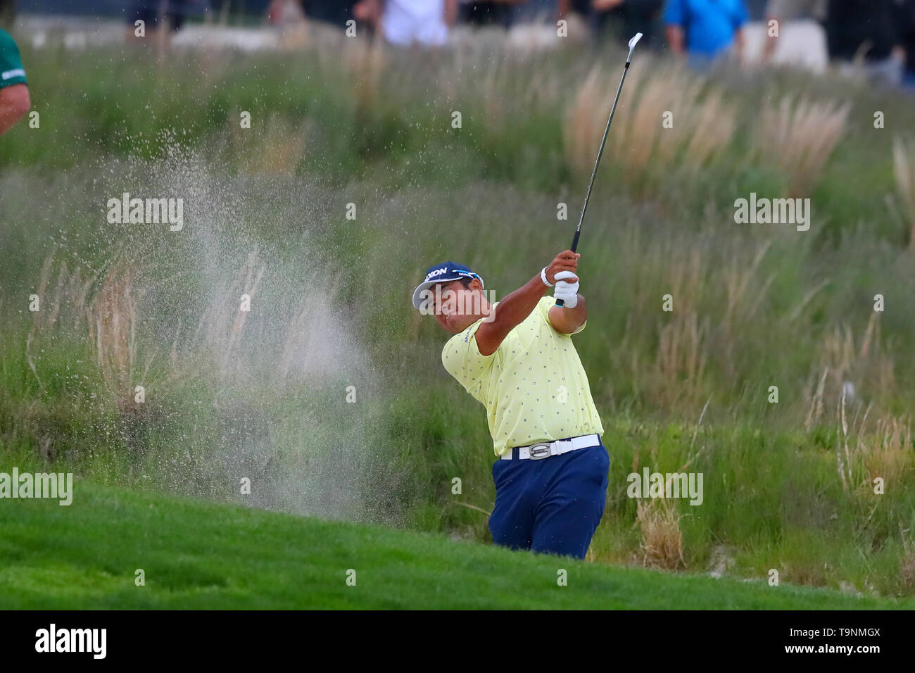 Farmingdale, New York, USA. 19th May, 2019. Hideki Matsuyama of Japan hits out of the bunker on the 18th hole during the 2019 PGA Championship at the Bethpage Black course Credit: Action Plus Sports/Alamy Live News Stock Photo