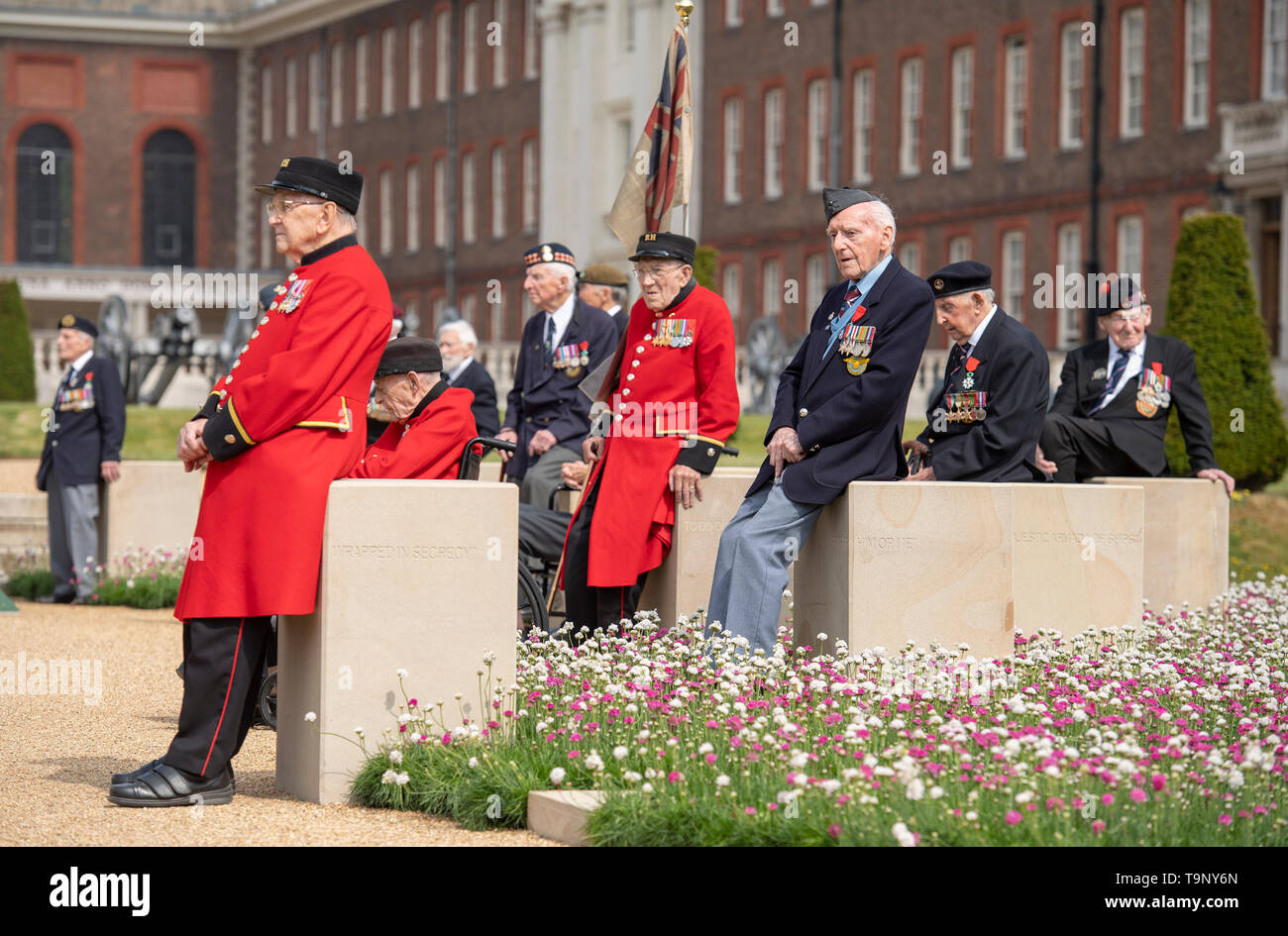 Royal Hospital Chelsea, London, UK. 20th May 2019. Chelsea Flower Show 2019 press day. Normandy Veterans on the D-Day 75 Garden sit on 15 stone plinths paced along the right hand side of the garden leading up to the Royal Hospital Chelsea. The garden will be moved to Normandy in time for the 75th Anniversary of D-Day. Credit: Malcolm Park/Alamy Live News. Stock Photo