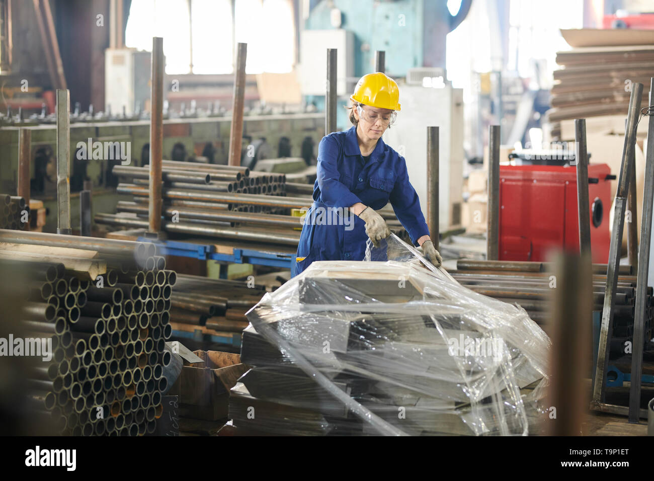 Female Worker in Warehouse Stock Photo