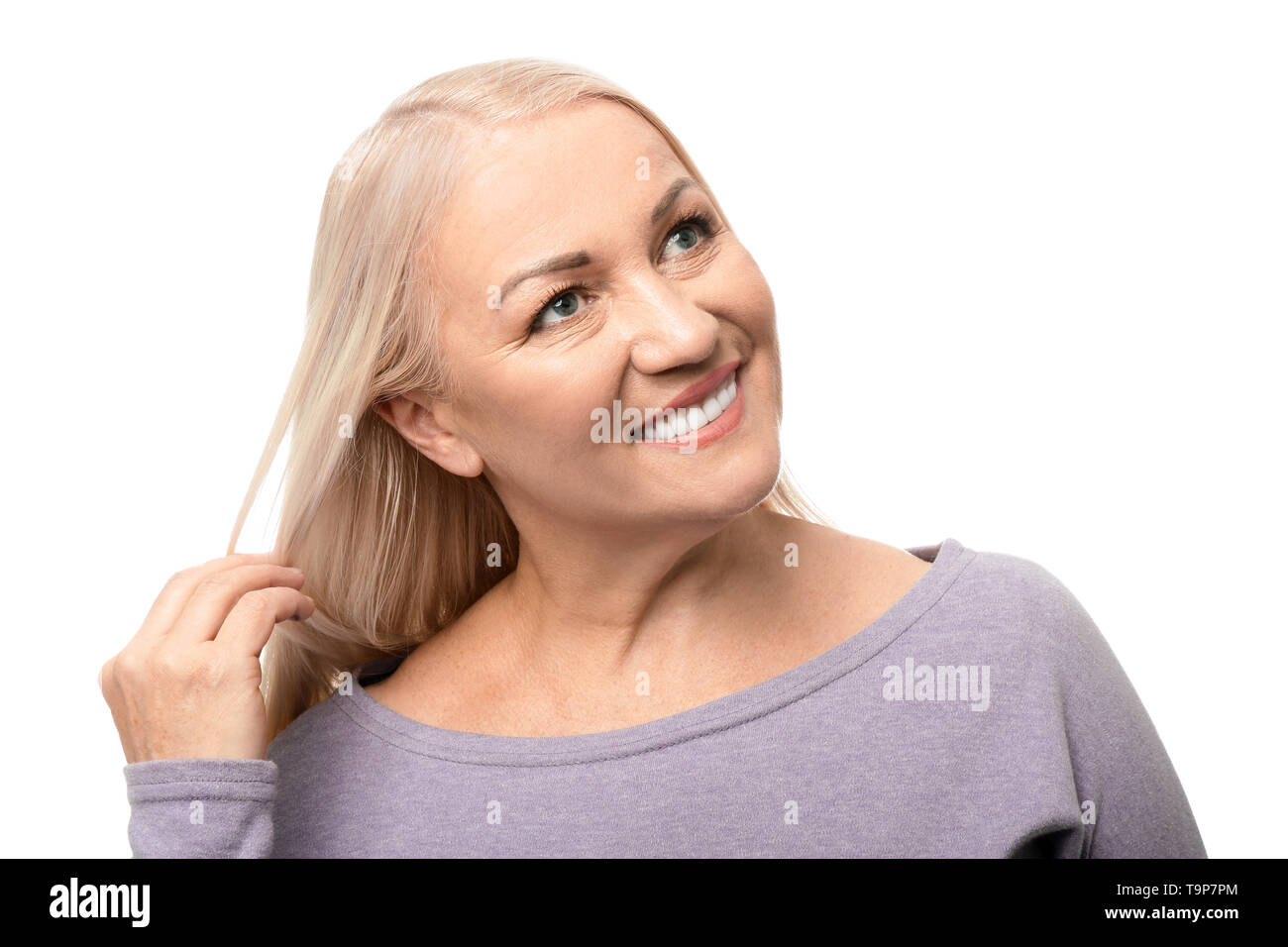 Portrait of beautiful mature woman on white background Stock Photo - Alamy