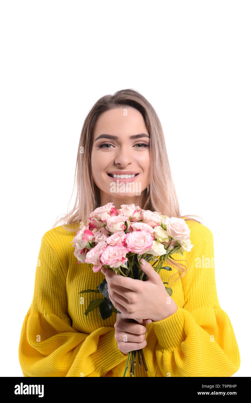 Beautiful young woman with bouquet of flowers on white background Stock ...