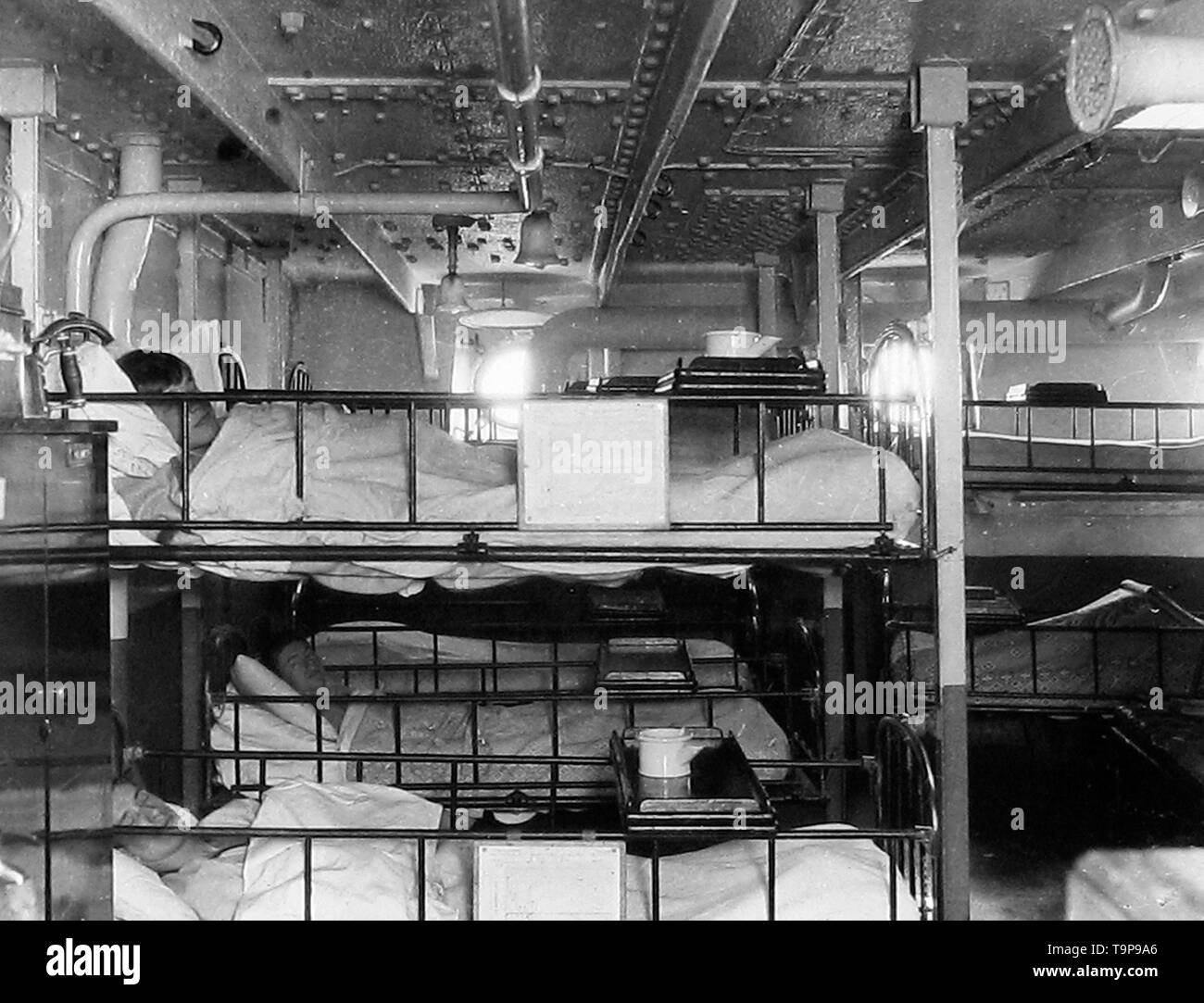 Royal Navy crew quarters on a battleship Stock Photo