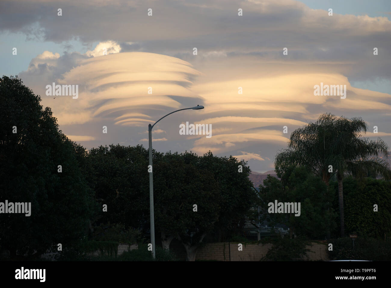 UFO shaped clouds Stock Photo