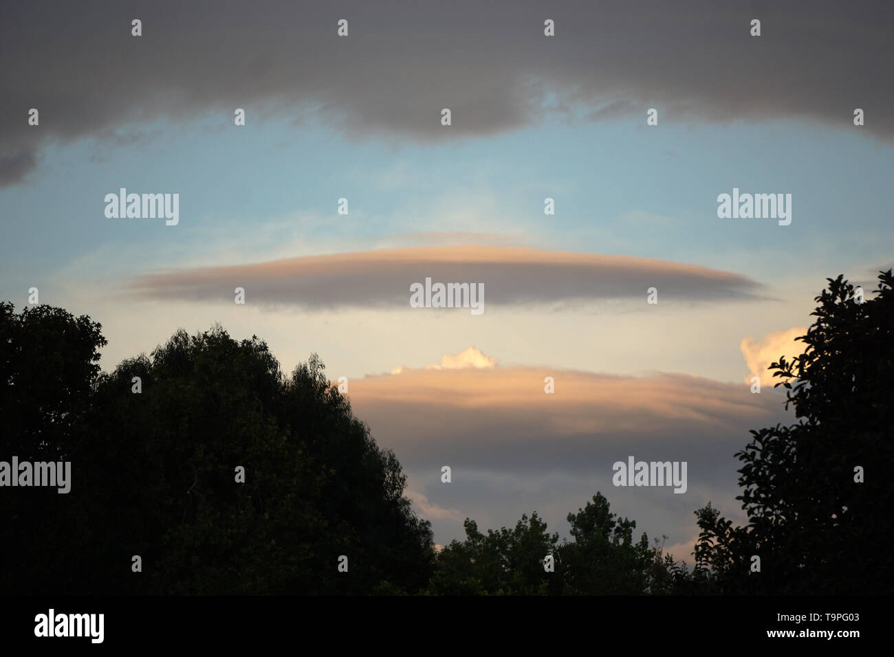 UFO shaped clouds Stock Photo