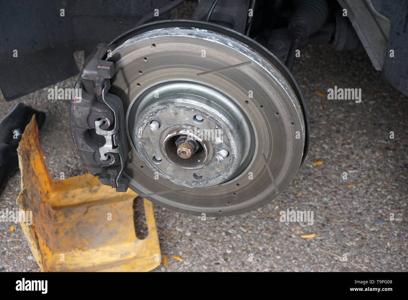 Damaged front brakes and axle Stock Photo Alamy