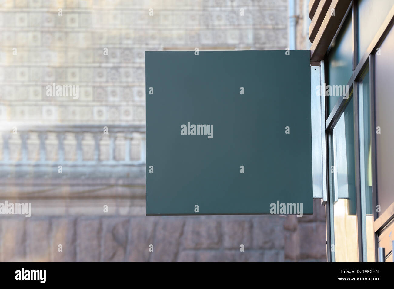 Signboard on facade of building Stock Photo - Alamy