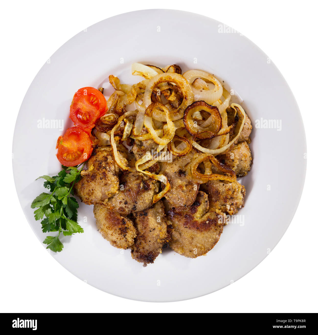 Tasty rabbit liver fried with onion garnished with fresh parsley and ...