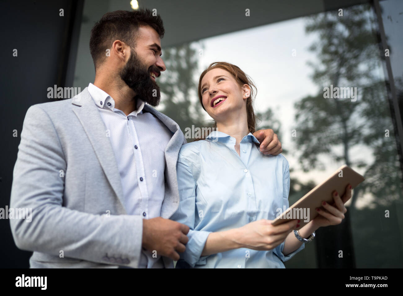 Business people walking and talking outdoor Stock Photo - Alamy