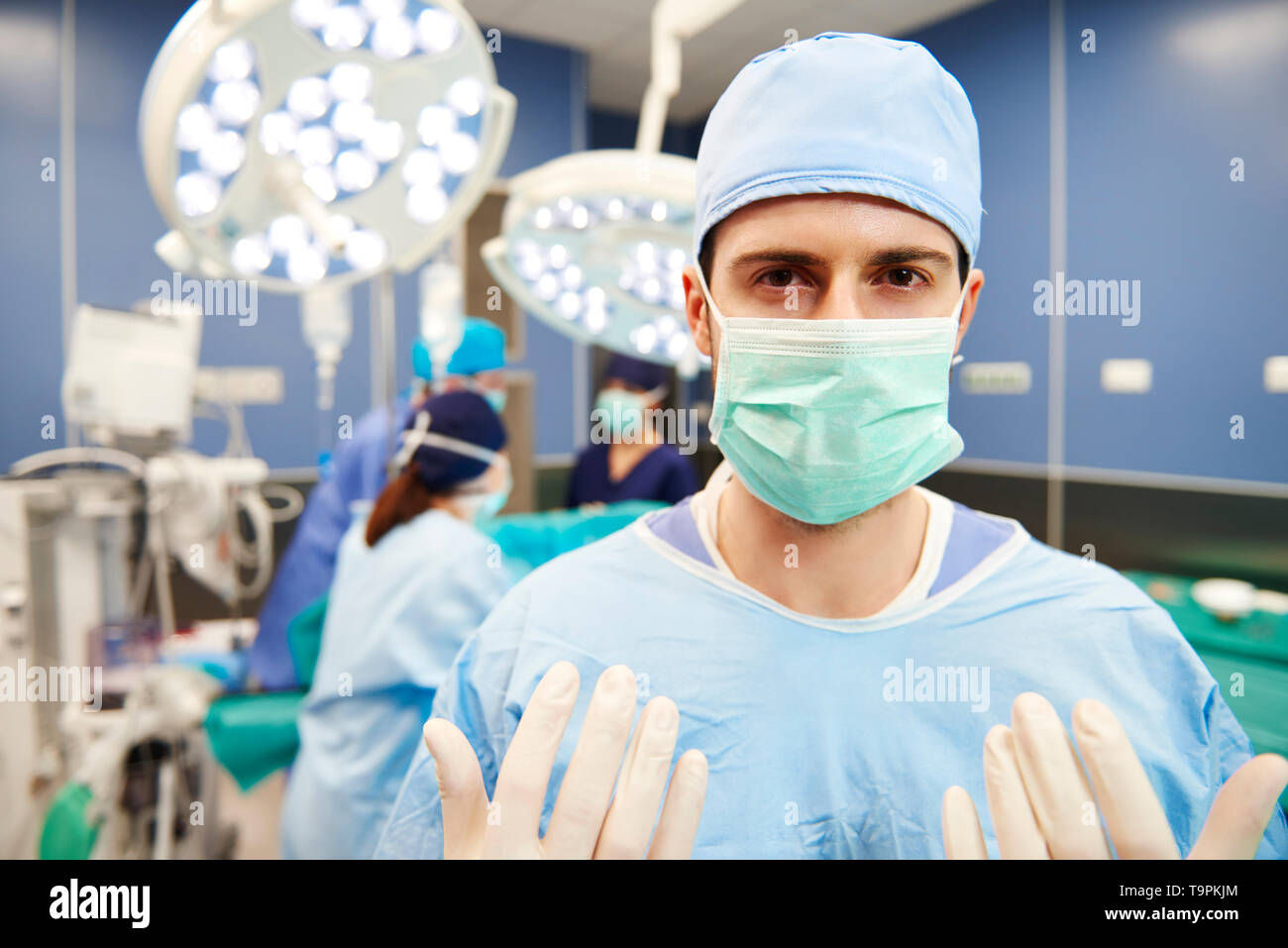 Portrait of male surgeon at operating room Stock Photo - Alamy