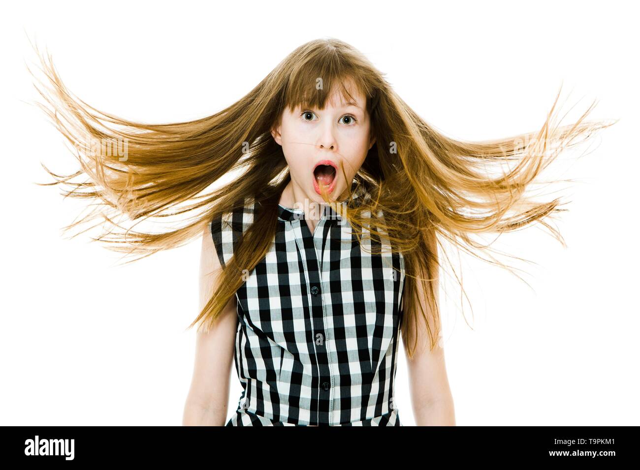 Surprised Teenaged Girl With Long Straight Flying Hairs Hair Style