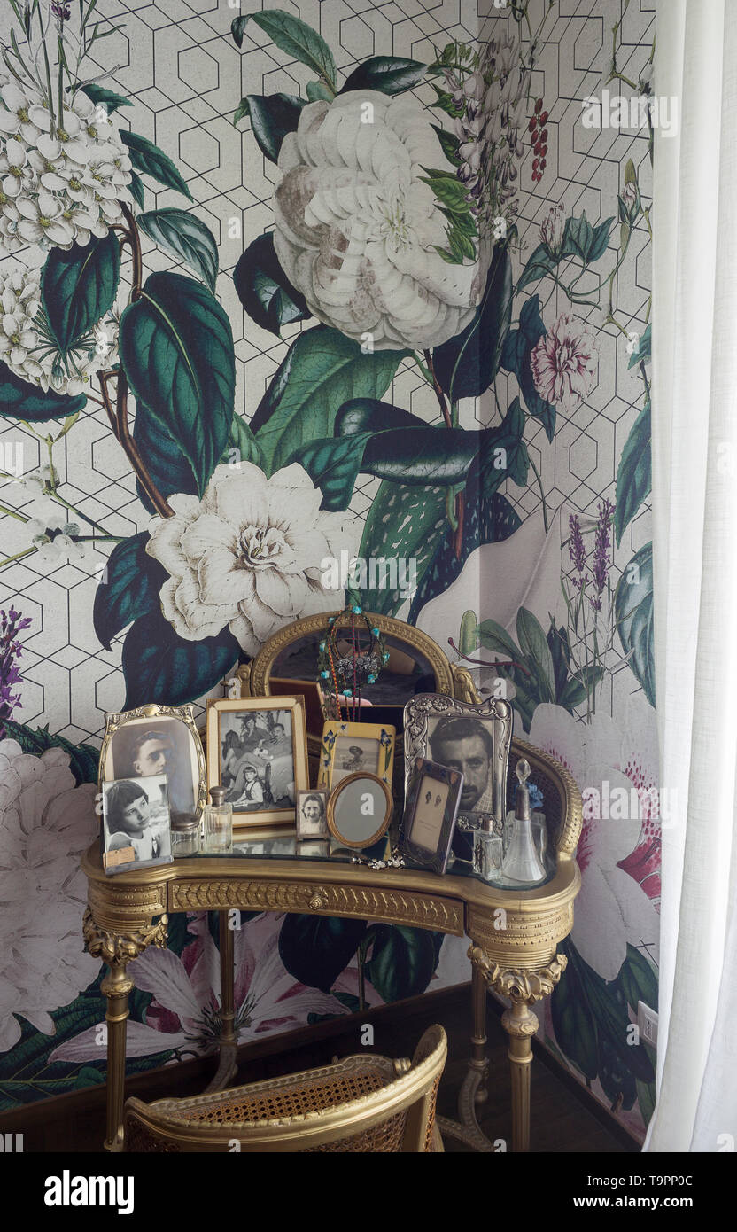 Vanity Table With Mirror In The Corner Of A Bed Room With