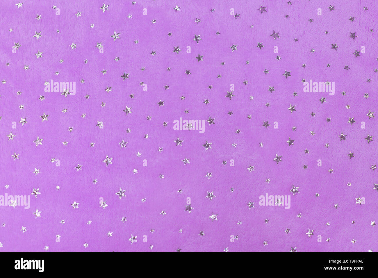 Fluffy Gentle baby lilac, ultraviolet fabric with silver stars. Soft pastel textile texture. Rose towel terry cloth. Stock Photo
