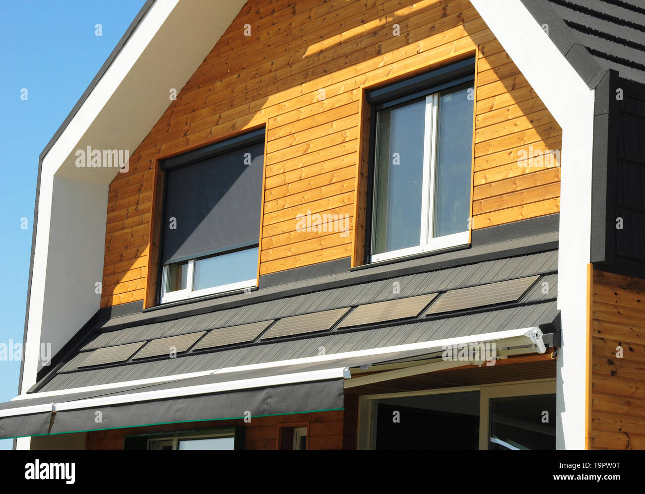 Close up on House Blinds Sun Protection Exterior. Windows in New Modern