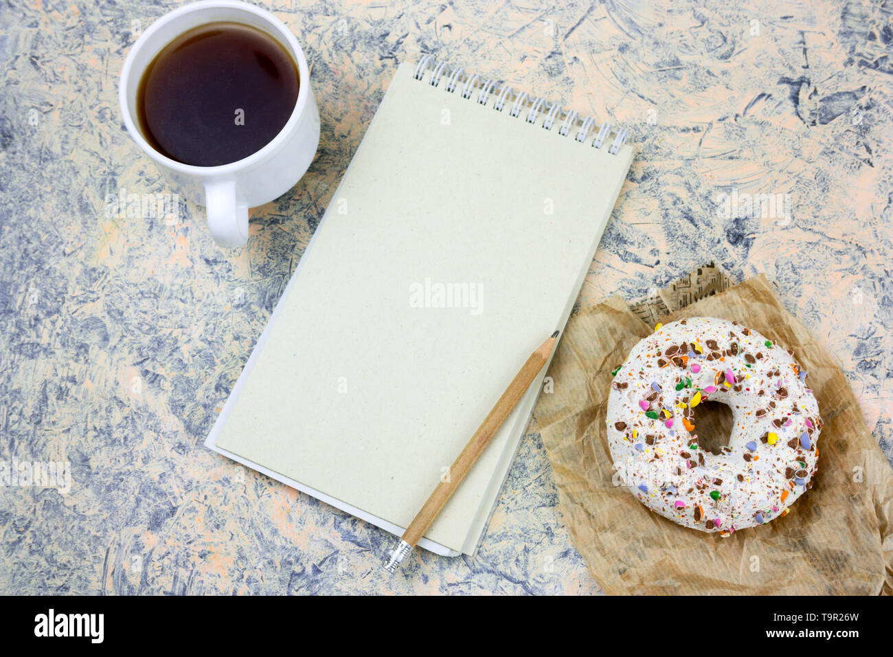 top view mock up notebook with blank white paper sheet ,coffee cup and ...