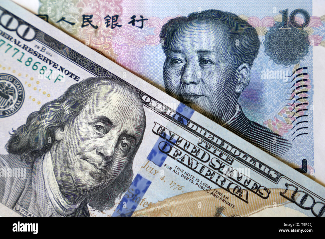 US dollar and chinese yuan notes. Concept of trade war between China