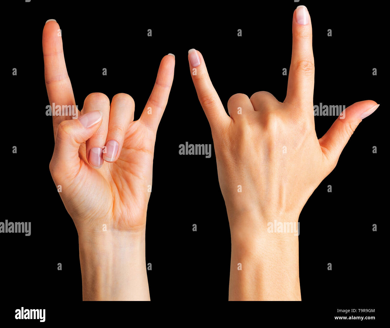 Set of women’s hands showing rock n roll sign or giving the devil 