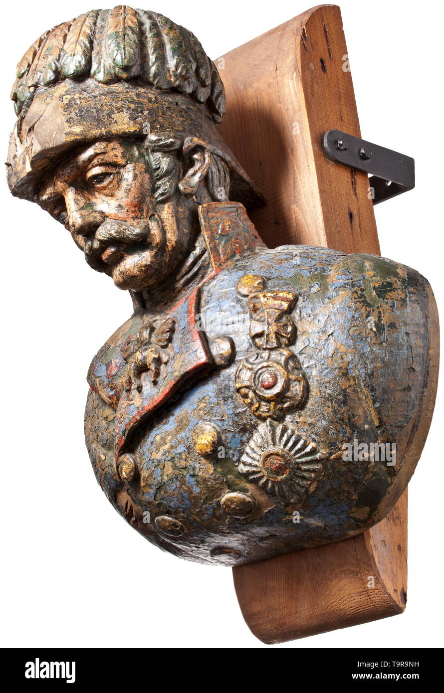 A figurehead SMS 'Radetzky' Colour portrait bust of field marshal Radetzky, carved in wood. Detailed shape, thick paint coat, partially brittle and splintered (the front part of the hat chipped due to manoeuvre damage). The bust is mounted on a wooden beam with wall fastening. Dimensions ca. 60 x 50 x 30 cm The screw frigate 'Radetzky' was equipped with 37 cannons and had a crew of 372 men. Under the command of Admiral von Tegetthoff and with Franz Jeremiasch as captain of the ship, the 'Radetzky' took part in the naval battle against the Danes n, Additional-Rights-Clearance-Info-Not-Available Stock Photo