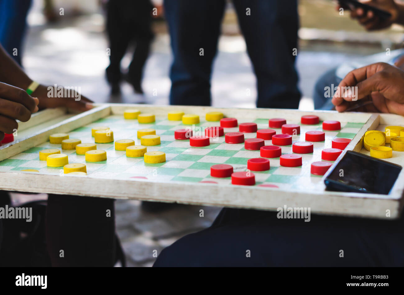 Checkers game teens not chess hi-res stock photography and images