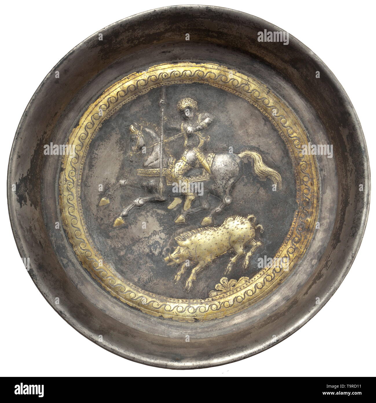 A late Scythian/early Sarmatian steppe-nomadic silver bowl with a hunting scene, late 4th - 3rd century BC Bowl worked in two p ancient world, Additional-Rights-Clearance-Info-Not-Available Stock Photo