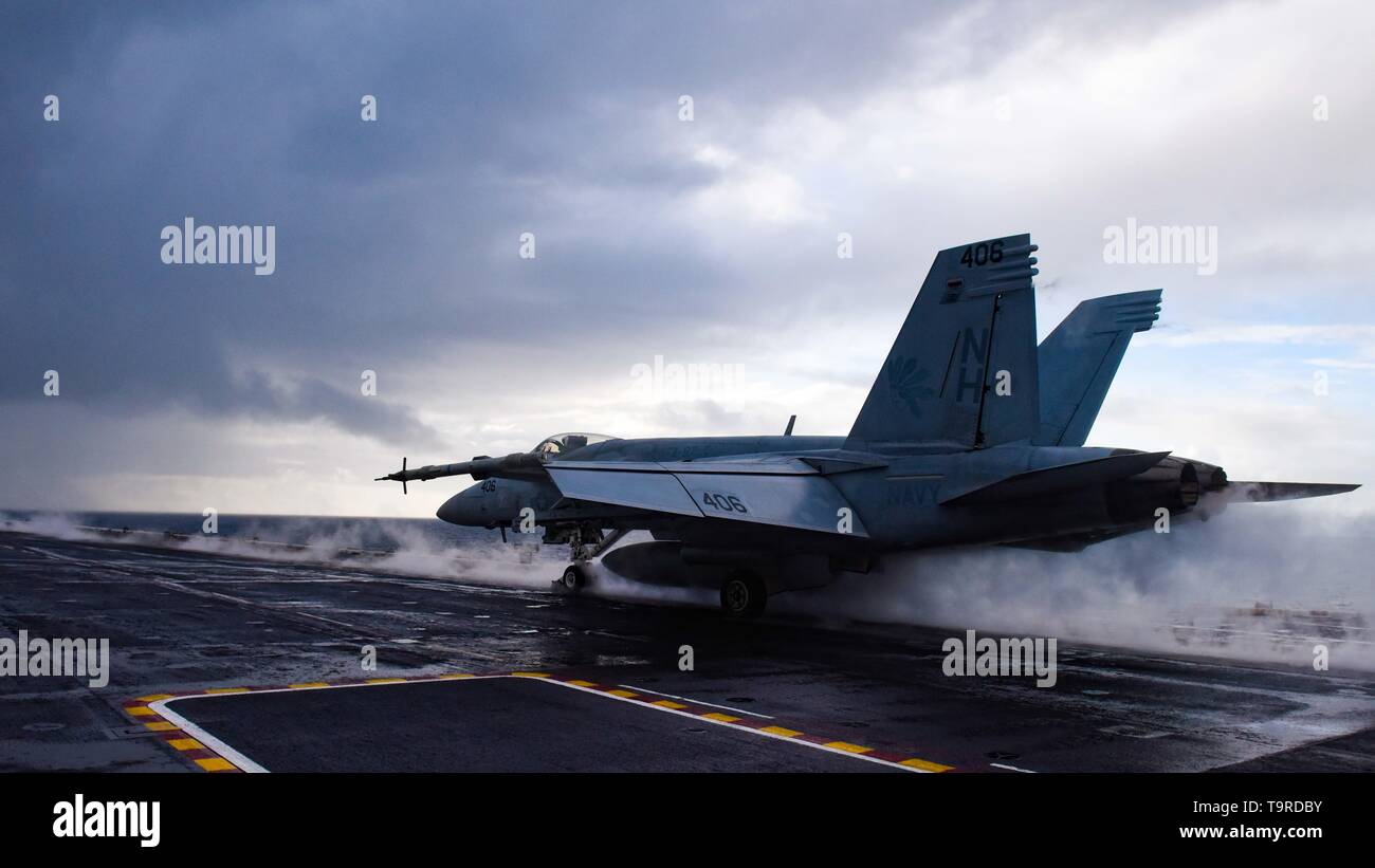 190516-N-ZM949-1112 GULF OF ALASKA (May 16, 2019) An F/A-18E Super Hornet assigned to the “Golden Warriors” of Strike Fighter Squadron (VFA) 87 launches from the flight deck of the aircraft carrier USS Theodore Roosevelt (CVN 71) while participating in Exercise Northern Edge 2019. Northern Edge is one in a series of U.S. Indo-Pacific Command exercises in 2019 that prepares joint forces to respond to crisis in the Indo-Pacific region. (U.S. Navy photo by Mass Communication Specialist 3rd Class Erick A. Parsons/Released) Stock Photo