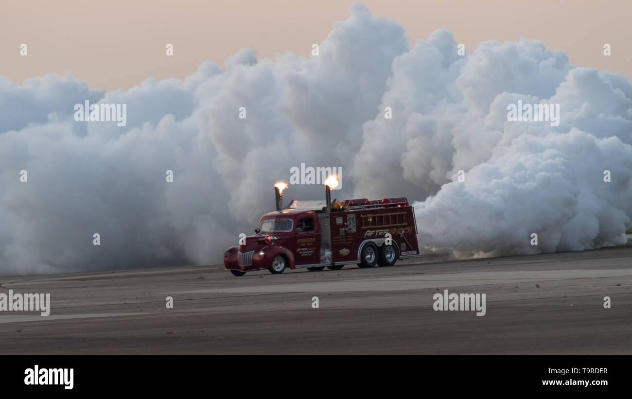 An Aftershock truck performs on the flight line during the Twilight Show before the Defenders of Liberty Air & Space Show at Barksdale Air Force Base, La., May 17, 2019. The airshow was first held in 1933 and is a full weekend of military and civilian aircraft and performances and displays. (U.S. Air Force photo by Airman 1st Class Lillian Miller) Stock Photo