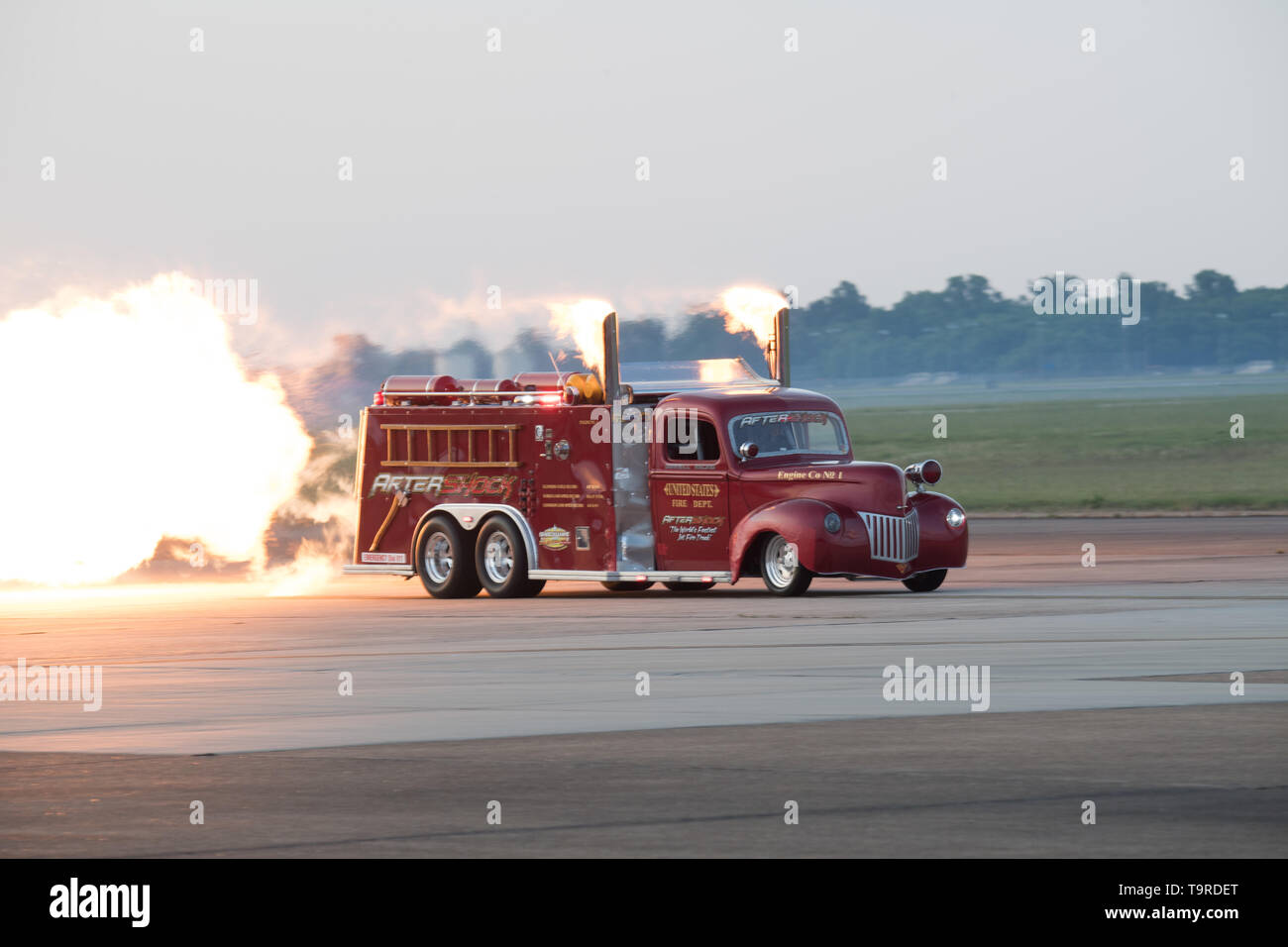 An Aftershock truck performs on the flight line during the Twilight Show before the Defenders of Liberty Air & Space Show at Barksdale Air Force Base, La., May 17, 2019. The airshow was first held in 1933 and is a full weekend of military and civilian aircraft and performances and displays. (U.S. Air Force photo by Airman 1st Class Lillian Miller) Stock Photo