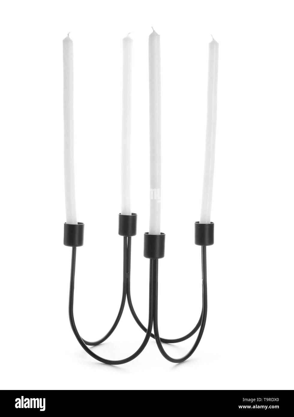 Metal holder with candles on white background Stock Photo - Alamy